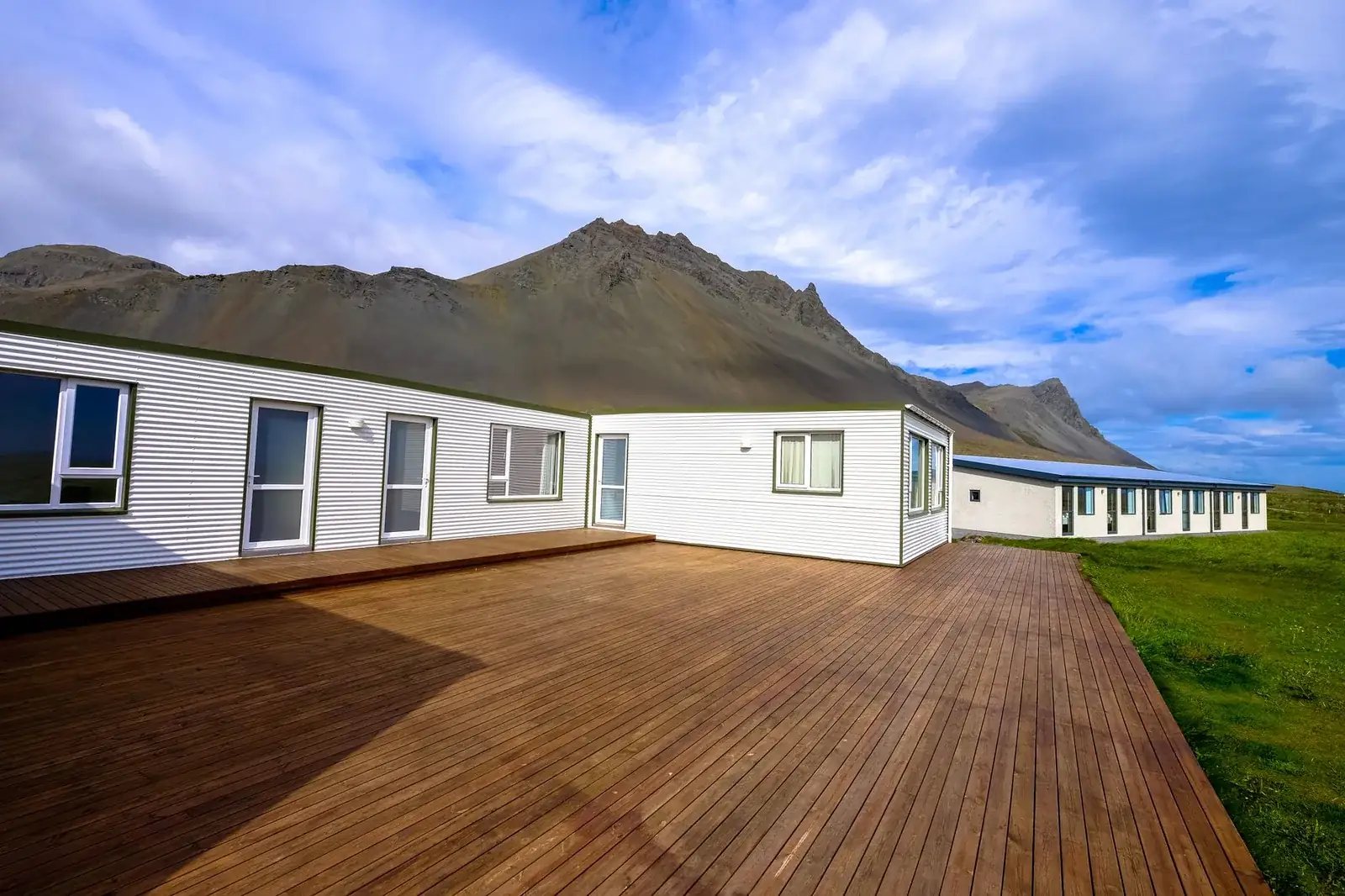 Large coastal house with wood siding
