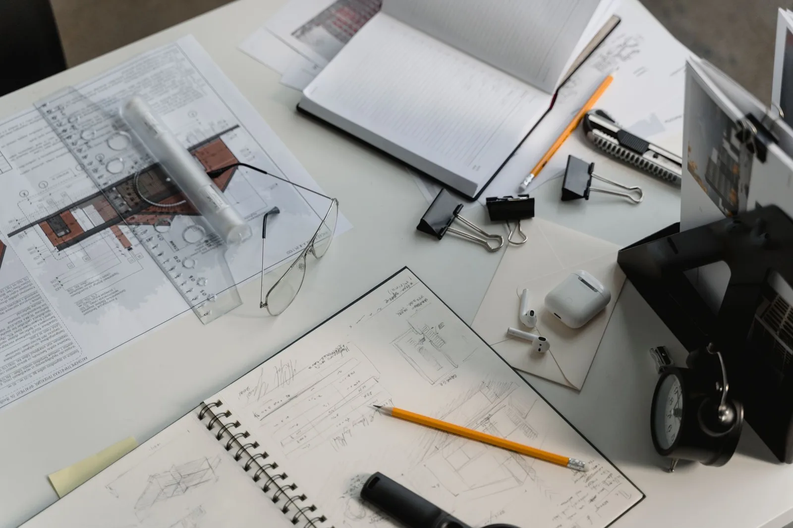Blueprint and renovation notes on a desk