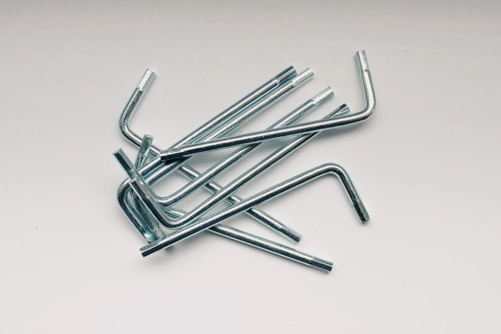 Hex keys and hardware laid on a work surface