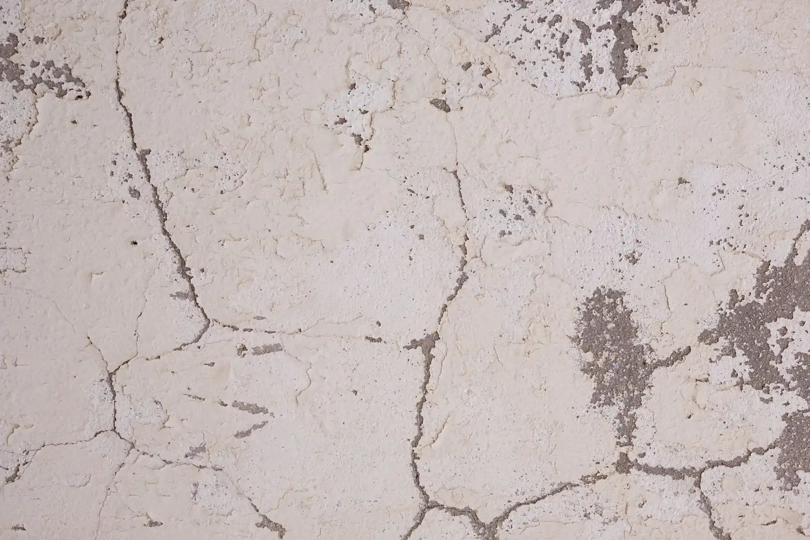 Cracked plaster on an interior wall