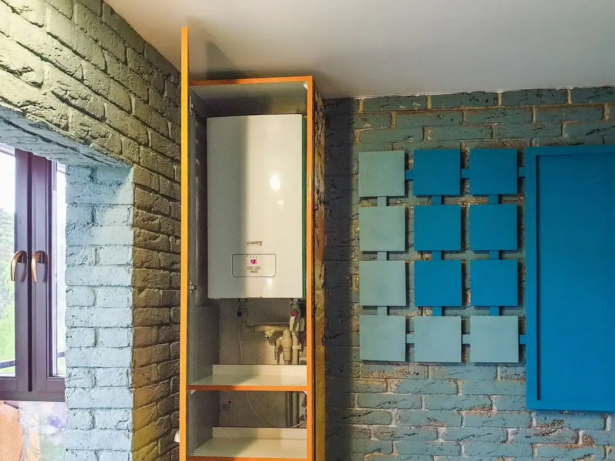 Water heating unit in a utility closet